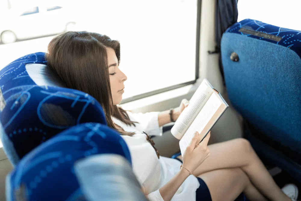 reading novel in bus